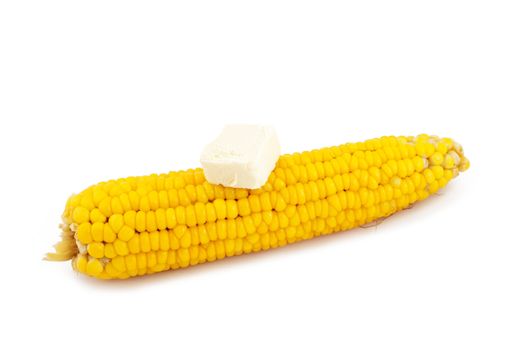 Boiled corn with a piece of butter.