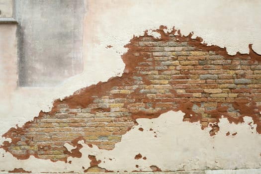 An image of an old weathered wall