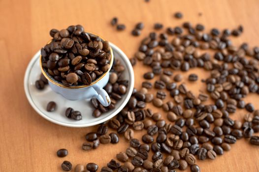 Still life of coffee grains and pieces of service