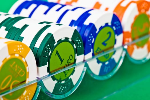 An image of poker chips in plastic box