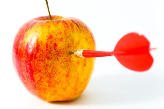 Red Apple with red Dart on White Background