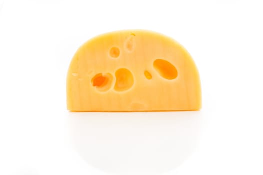 An image of slab of cheese on white