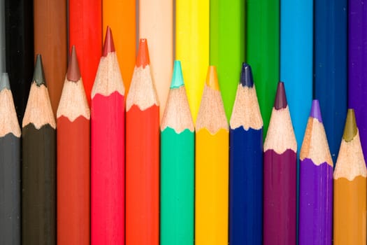 Stock photo: an image of row of coloured pencils