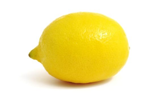 An image of a fresh yellow lemon on white background