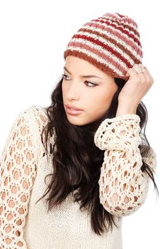 Pretty black hair woman holding her cap, isolated on white background