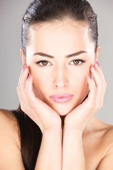 Portrait of a pretty young brunette woman