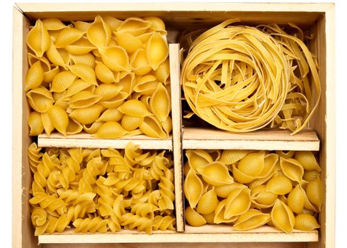 Set of four varieties of pasta in a wooden box