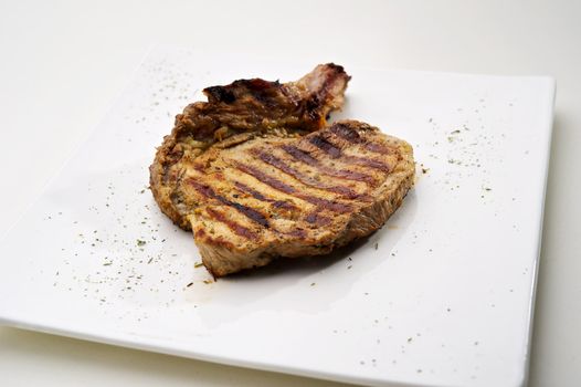 Chicken Steak served on white plate