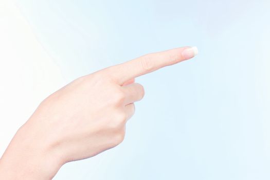 woman's hand point with index finger