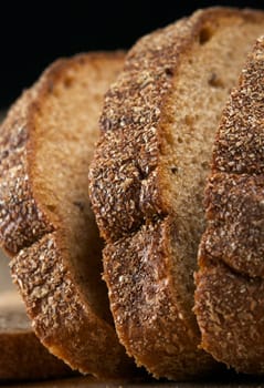 Sliced bread on the board closeup