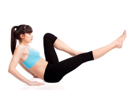 Young woman doing fitness exercises, isolated on white