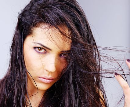 Portrait of a pretty woman with wet hair