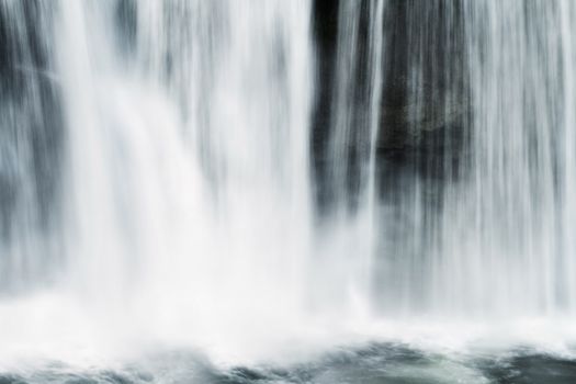 Abstract of flowing water from a waterfall. 