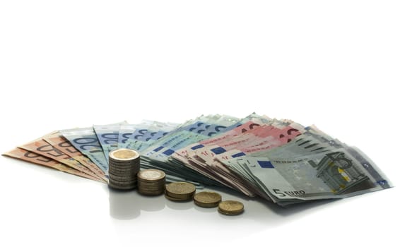 euro money paper and coins on ioalted white