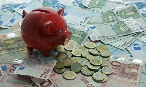 euro money paper and coins on ioalted white with red money pig