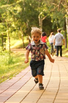 The little boy on walk