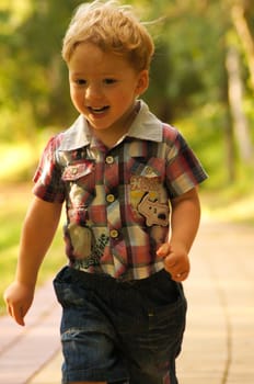 The little boy on walk