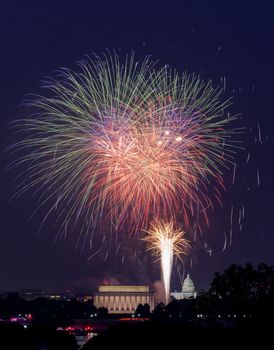 Independence Day fireworks celebrations over monuments in Washington DC