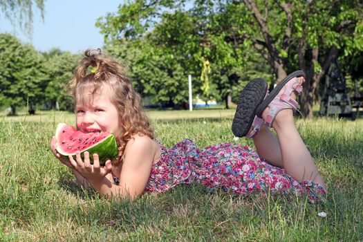 beautiful little girl with watermelon