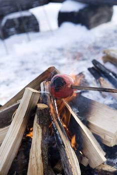 Campfire with selective focus in the winter