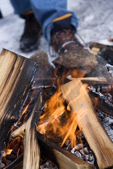 Campfire with selective focus in the winter