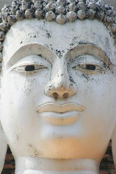 Buddha face of a statue in Wat Yai Chai Mongkol, Ayutthaya Thailand