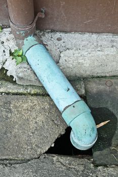 Photo of Sewage pipe for drain water and Garbage into a Concrete drain.