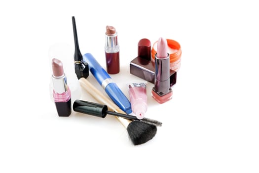 Modern cosmetic accessories on a white background
