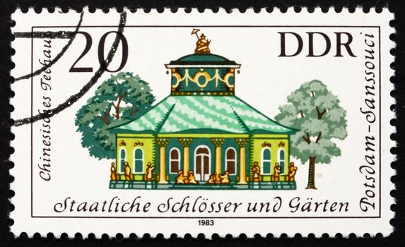 GDR - CIRCA 1983: a stamp printed in GDR shows Chinese Teahouse, Sanssouci, Summer Palace of Frederick the Great, King of Prussia, Potsdam Gardens, Germany, circa 1983