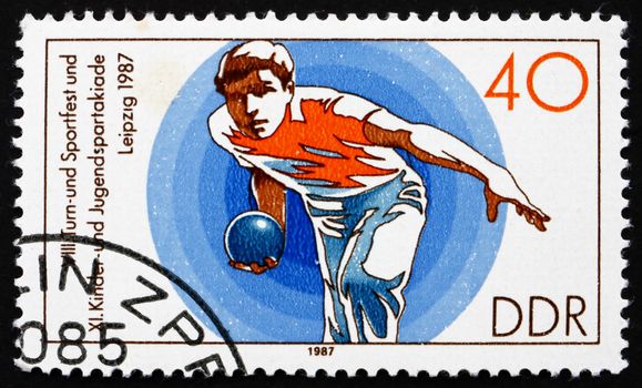 GDR - CIRCA 1987: a stamp printed in GDR shows Bowling, 11th Children�s and Youths� Spartakiade, circa 1987