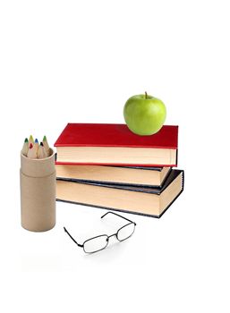 Book and green apple