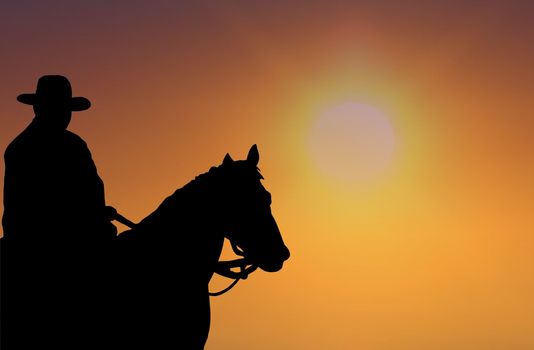 Cowboy looking at sunset