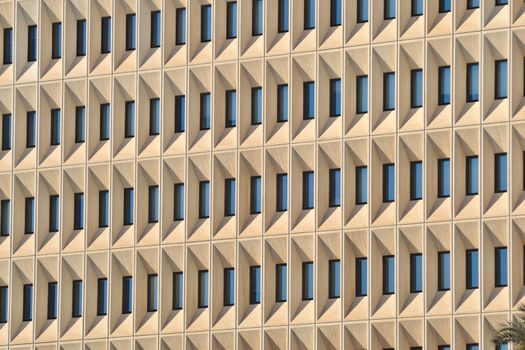 rows of windows in the new building, Malaga,