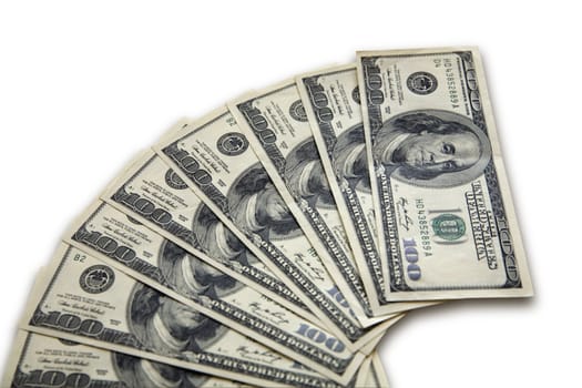 pile of dollar banknotes on a white background
