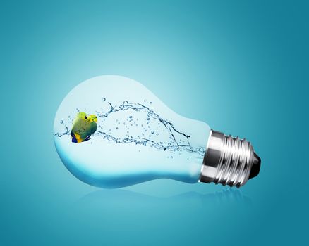 Anglefish jumping into light bulb, Good Concept for new Idea.