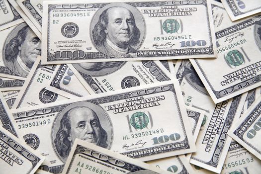 background from chaotically lyings one hundred greenbacks