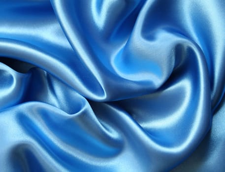 Smooth elegant dark blue silk can use as background 