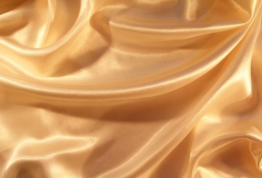 Smooth elegant golden silk can use as background

