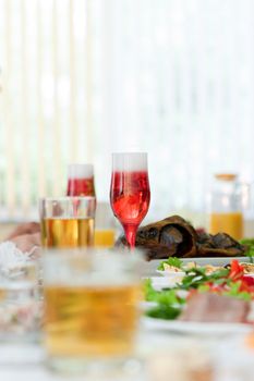 a glass of champagne at the festive table