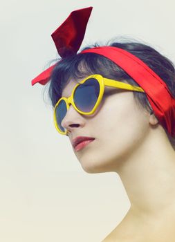 Young beautiful woman in sunglasses 