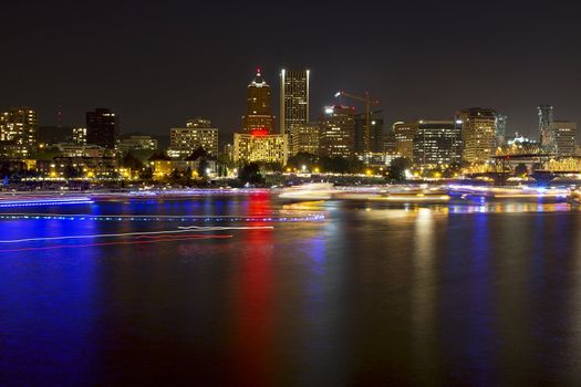 Boat Lights Trails Along Willamette River the City Skyline of Portland Oregon Waterfront at Night