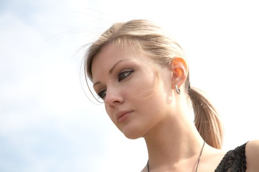 Portrait of the beautiful girl close up