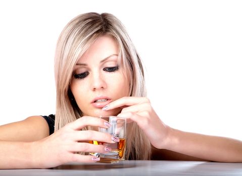 The girl with  glass of whisky on a white background