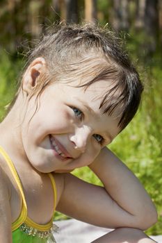 Baby girl wet after swimming, summer times