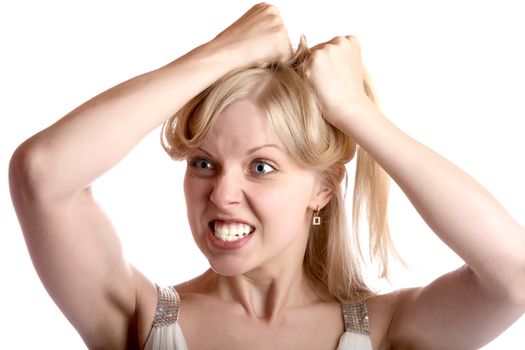 The girl with a malicious look suffices itself for hair on white background