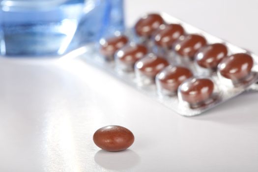 blister with medicines in tablets lays on a table