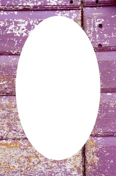Background of an old painted, crumbled door. Handle on purple wooden planks. Isolated white oval place for text photograph image in center of frame.