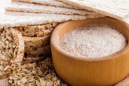 Various dietary oat products on wooden table