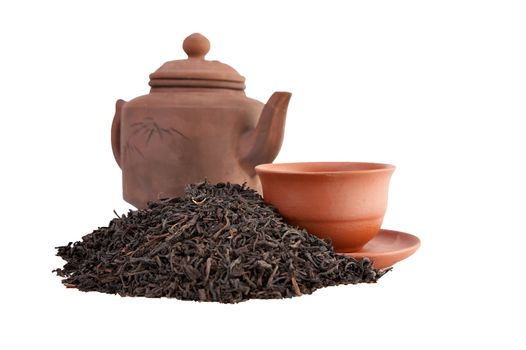 Tea a teapot and a cup on a white background