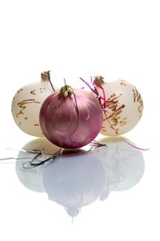 Christmas spheres with reflexion on a white background